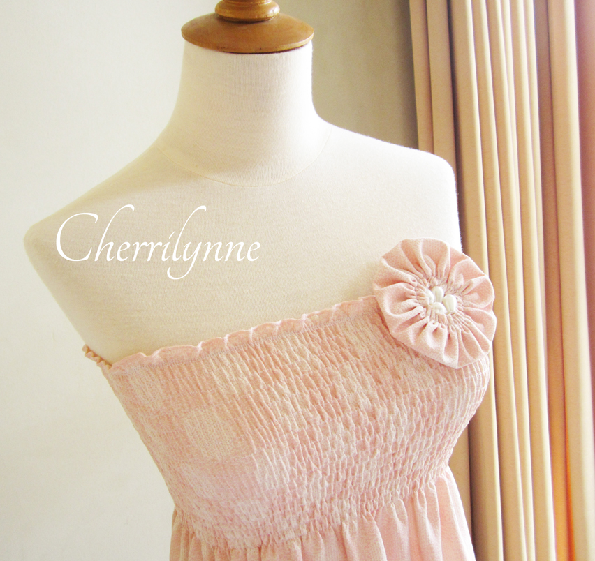 Summer Dress With Smocking Details And Fabric Flower Brooch