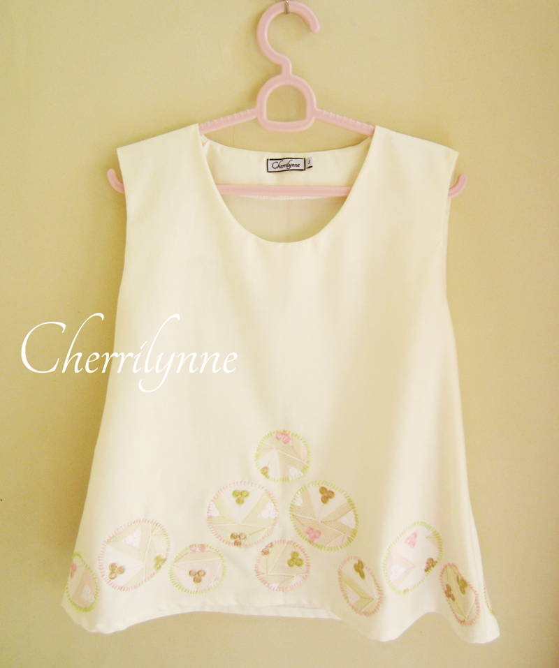 Sleeveless Top With Appliques